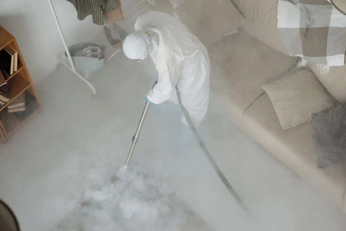 Biohazard cleanup technician in protective equipment, Indian Wells, CA